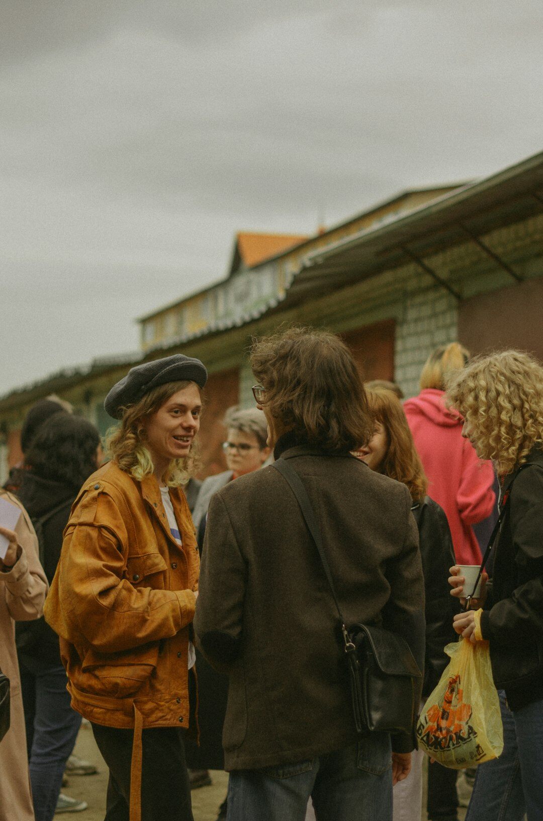 Danish town square market with people talking